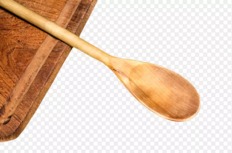 长方形砧板上的长柄木汤勺实物