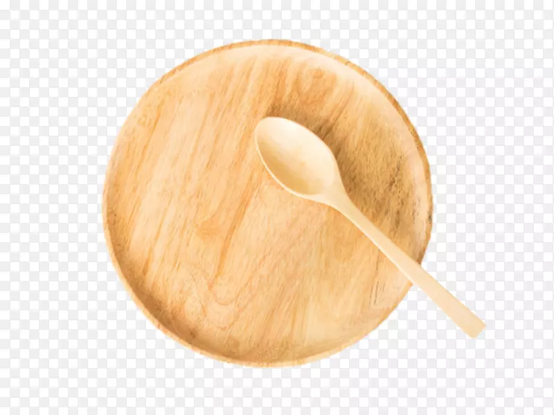 棕色圆形碟子上的木汤勺实物