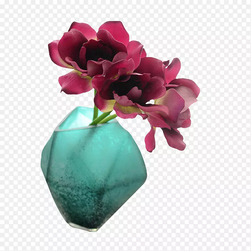 绿色玻璃杯中的花朵