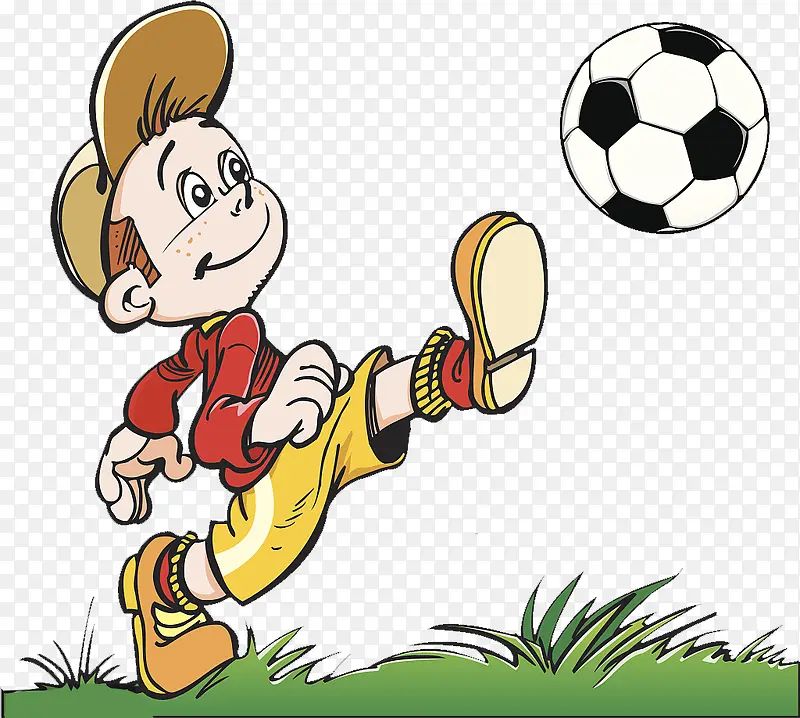 草地上踢足球的小男孩
