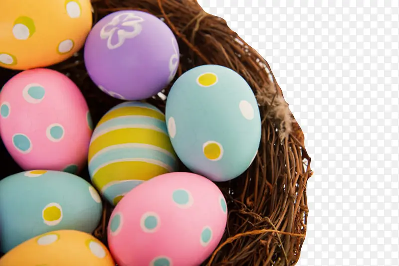 彩色庆祝复活节鸟巢中的食用彩蛋