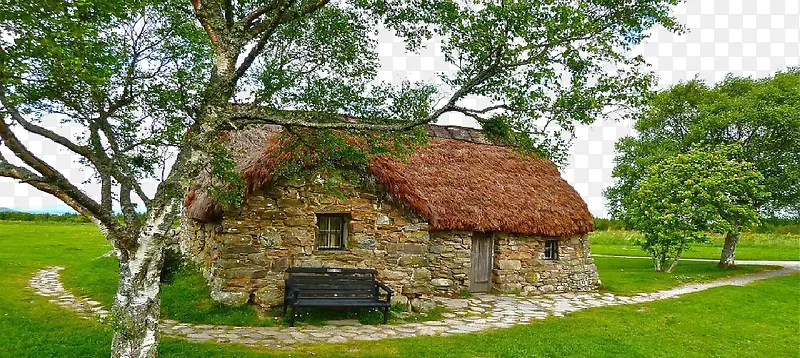 绿色草地和石头小屋