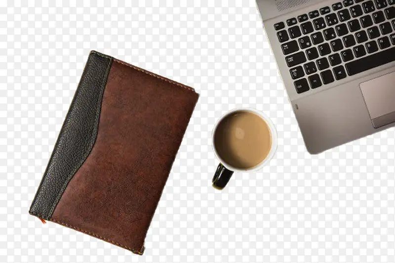 实物皮质笔记本和电脑书和咖啡