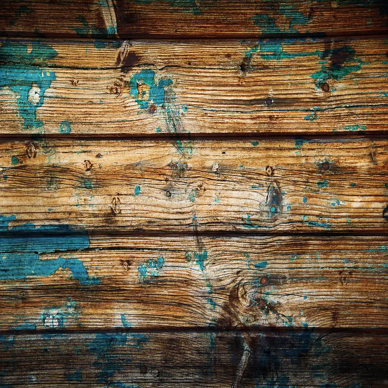 沾满蓝色油漆的木板