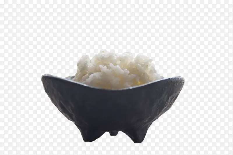 黑色陶碗里的白色米饭