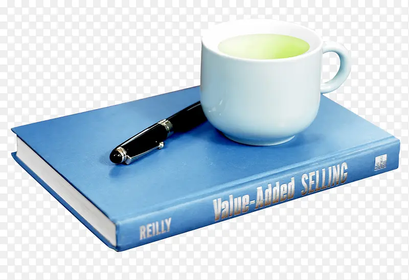 蓝色书本上的咖啡杯