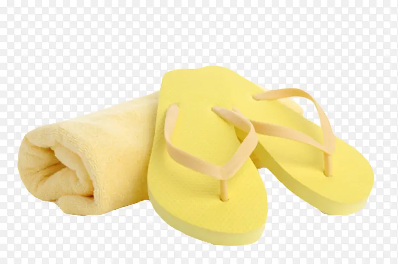 黄色不易吸水的海边沙滩鞋和毛巾