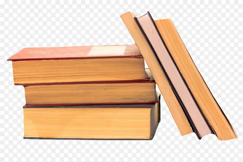 发黄纸质的书籍依靠的一叠书实物