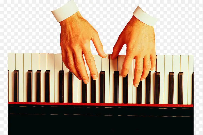 弹奏钢琴的双手特写摄影