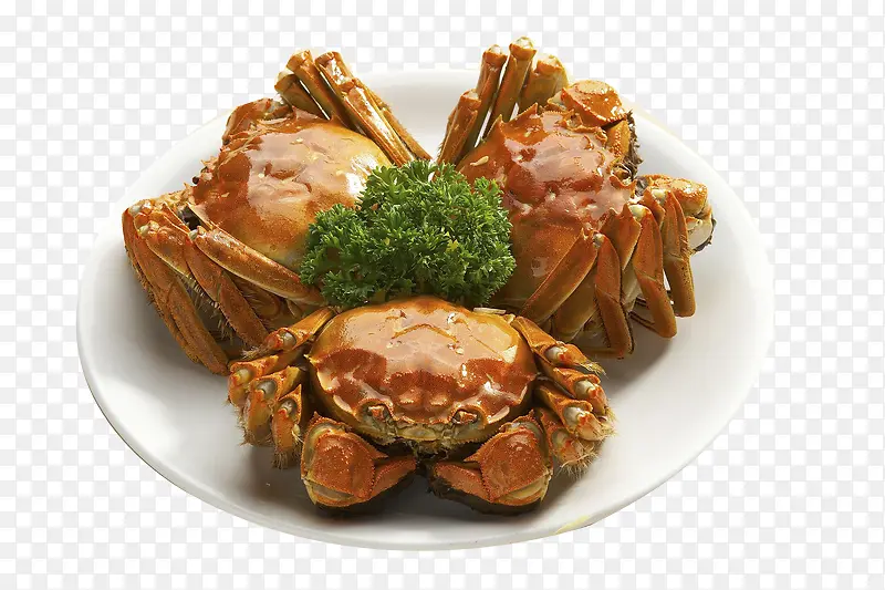 盘子里的3只螃蟹与西蓝花