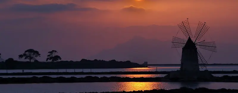 夕阳风车远山倒影海报背景