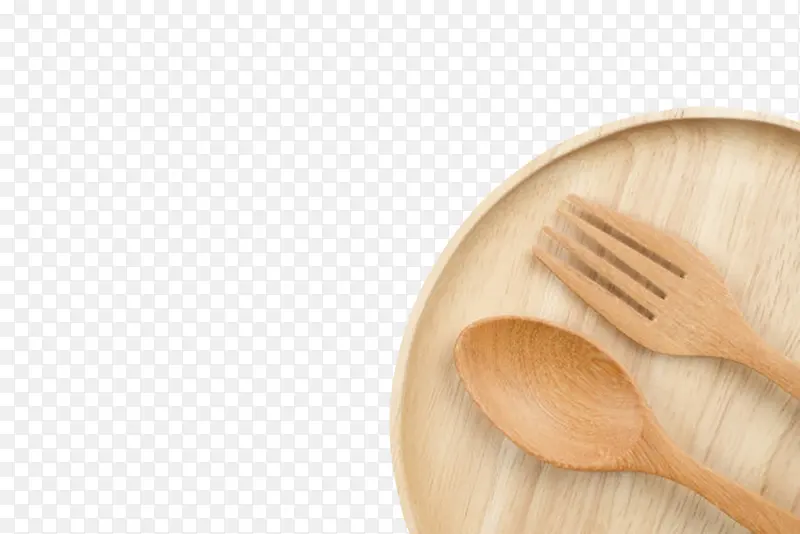 棕色木质纹理盛着木勺子叉子的圆
