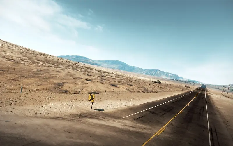 荒凉沙漠中的公路海报背景