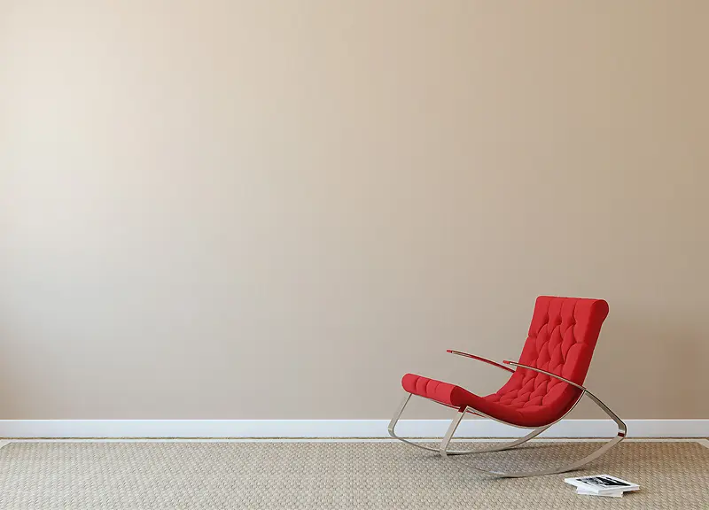 房间里的红色的沙发摇椅