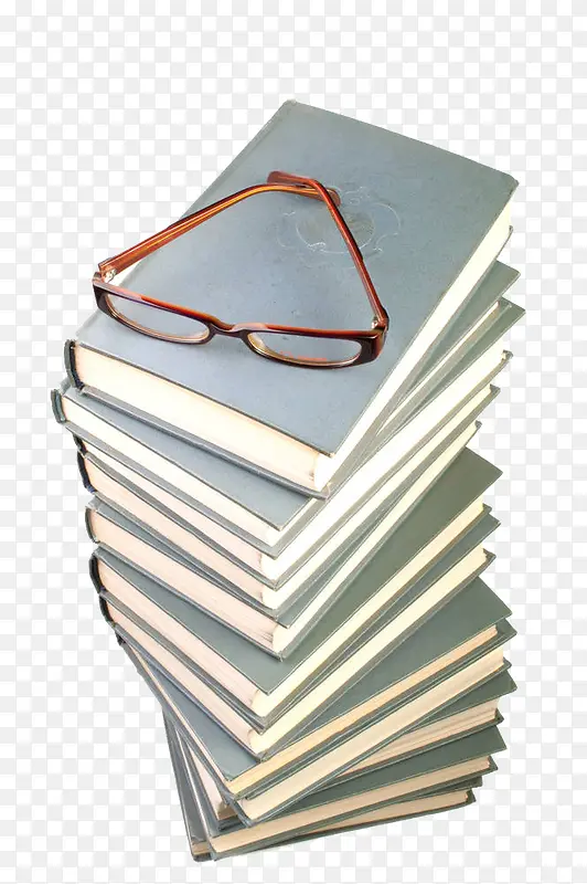 叠摞书上的眼镜