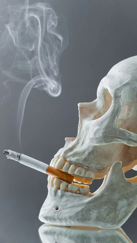 白骨骷髅和香烟图案H5背景元素