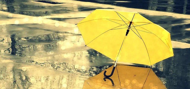 唯美雨天黄色雨伞背景