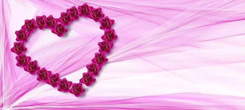 粉红色纱巾上的红色花摆成心形