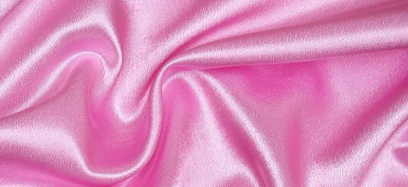 粉色质感褶皱丝绸珠宝背景