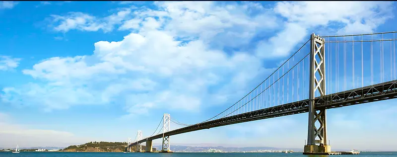 蓝天云朵大桥背景图