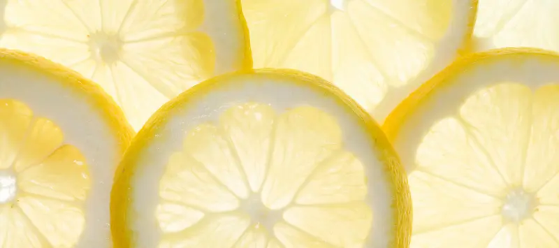 黄色柠檬片简约背景图
