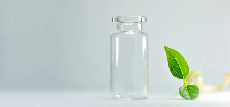 小清新文艺玻璃瓶绿叶背景