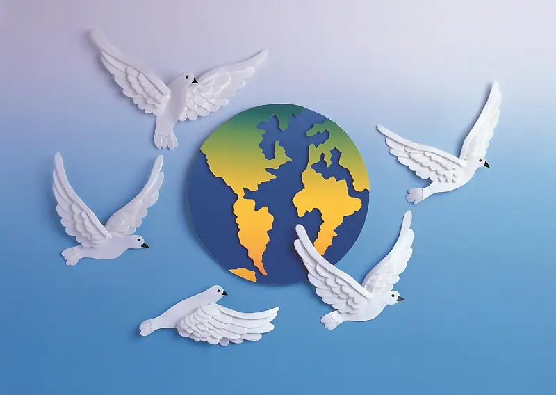 地球和平鸽纸雕背景