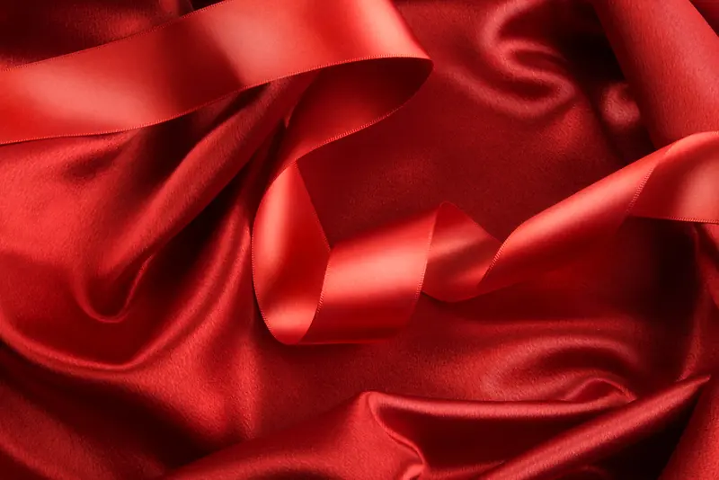 红色绸缎与绸带背景素材