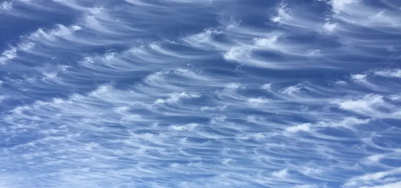蓝色云卷背景图