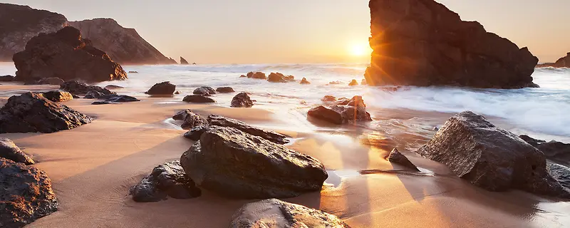 黄昏大海沙滩石头背景