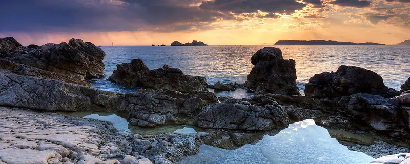 黄昏大海岩石背景