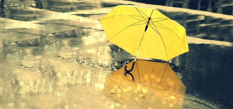 简约黄色雨伞海报背景